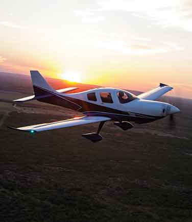 Lancair Mako in the sky at sunset